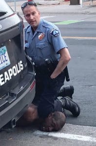 George Floyd being knelt on by a police officer on 25 May 2020 (Credit: Wikipedia)