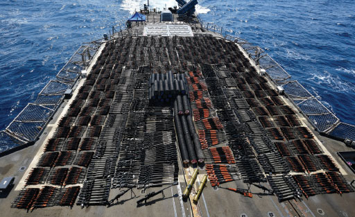 Weapons that the U.S. Navy described as coming from a hidden arms shipment aboard a stateless dhow are seen aboard the guided-missile cruiser USS Monterey on Saturday, May 8, 2021. The U.S. Navy announced Sunday it seized the arms shipment hidden aboard the vessel in the Arabian Sea, the latest-such interdiction by sailors amid the long-running war in Yemen. (U.S. Navy)