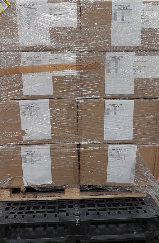 IDSS says they have developed systems to deal with large stacked pallets, like the one shown here, that eliminate the need to unpack skids in order to support screening. IDSS image.