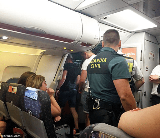 2021 saw an all-time high of 1,099 investigations of disruptive and unruly passengers which was during the height of the Covid-19 pandemic. Shown here police are escorting unruly passengers off of an EasyJet flight. SWNS image.