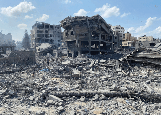 Palestinians inspect the damage following an Israeli airstrike on the El-Remal area in Gaza City on October 9, 2023. Image by Palestinian News & Information Agency (Wafa) in contract with APAimages.
